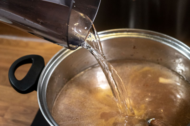 Water being poured into the pot
